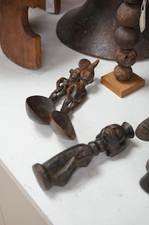 Two African tribal busts, two carved spoons and three carved Kamba Kenyan stools (11). Largest stool 28cm high. Condition - mostly good, some staining to seat of largest stool